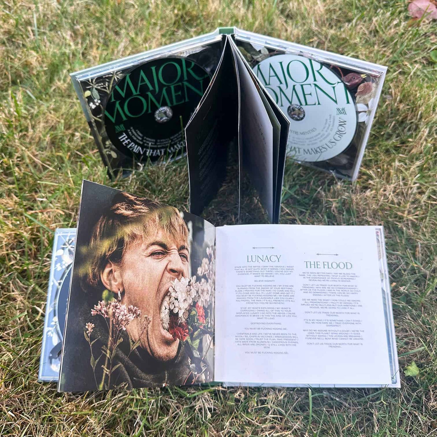"The Pain That Makes Us Grow" Deluxe Double CD Book